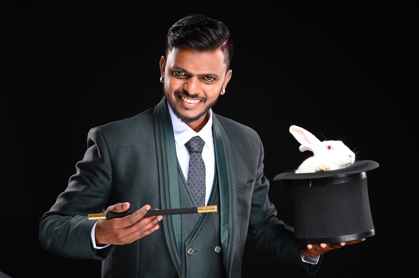Vicky Krish performing a classic hat production